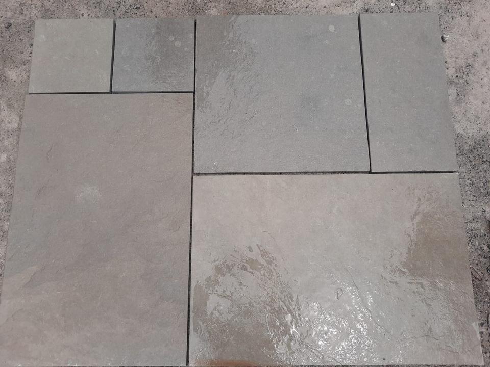 dove grey limestone paving wet